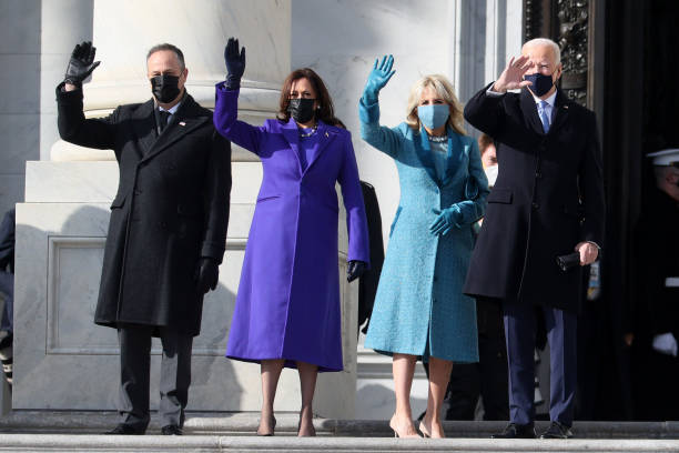 WASHINGTON, DC - JANUARY 20: (L-R) Doug Emhoff, U.S. Vice President-elect Kamala Harris, Jill Biden and President-elect Joe Biden wave as they arrive on the East Front of the U.S. Capitol for  the inauguration on January 20, 2021 in Washington, DC. (Photo by Joe Raedle/Getty Images)