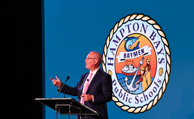 Mr. Lars Clemensen takes that stage at the 2024 NYSCOSS Fall Leadership Summit after a performance by the Hampton Bays Jazz Band and Select Choir.

Photo courtesy of NYSCOSS