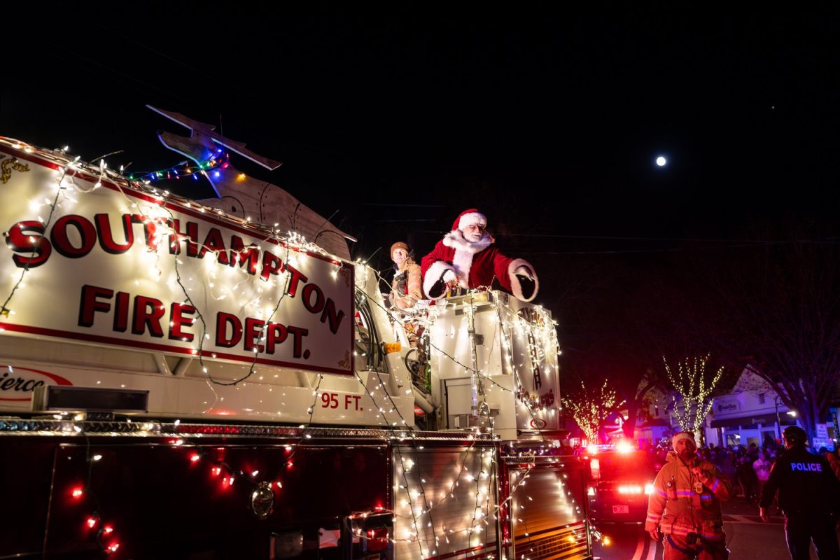 Santa Waves From the Top of a Fire Truck During the Southampton Christmas Parade.

Image credit: Ron Eposito